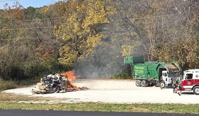 High Ridge Fire puts out flaming pile of trash in House Springs