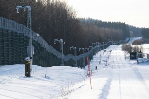 The new barbed wire border fence on the closed border between Finland and Russia