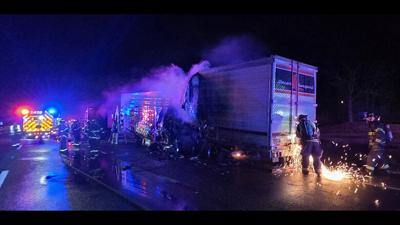 Fire crews cut into a tractor-trailer hauling Lunchables food products that caught fire early this morning.