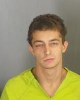 Arnold man allegedly escapes in handcuffs, steals and crashes police SUV