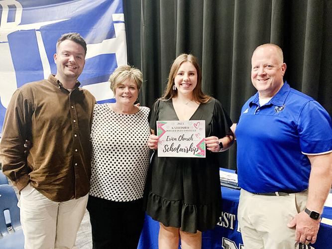Erica Church receives one of the Kati Fisher Memorial scholarships in May 2023 from the Fisher family.