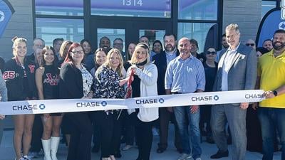 Chase branch operations lead Brandy Voiles, left, and branch manager Cindy Liberman cut the ribbon on Oct. 18 at the bank’s Arnold location, 1314 Jeffco Blvd.