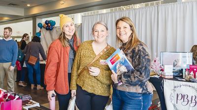 From left, Allison Nieters, Megan Rice and Edie Rice visit vendors at the 2023 wedding fair. This year's fair is set for Sunday, Feb. 4.