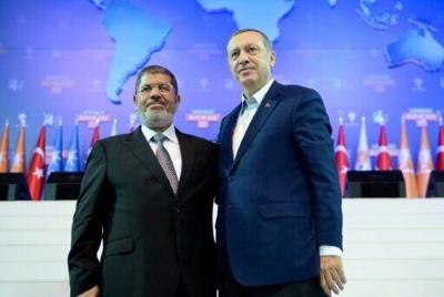 Turkey's leader Recep Tayyip Erdogan meets Egypt's then-president Mohamed Morsi, who rose to power democratically from the Muslim Brotherhood, in 2012 in Ankara