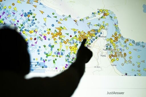 Iran's powerful chief negotiator threatened the United States with further escalation in the standoff over the Strait of Hormuz