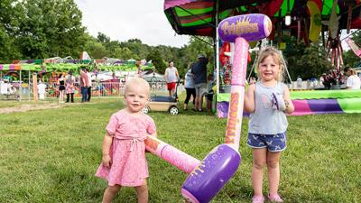 Ivorly Rodgers, 1, and her sister, Oakley, 3, of Festus won prizes at the annual Twin City Firecracker Festival.