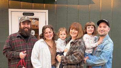 From left, Jonathan and Rachael Steudeman are opening Behold Coffee with longtime friends Jonathan and Katy Goldstein, who are holding their daughters Annie and Olivia.