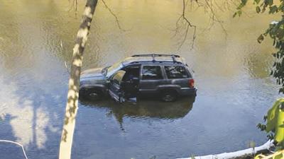 jeep stuck in big river