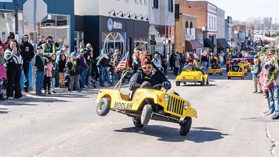The tourism commission awarded a grant for a Mardi Gras parade, which was held for the first time earlier this year.
