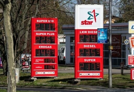 A digital display shows fuel prices at a petrol station in Berlin
