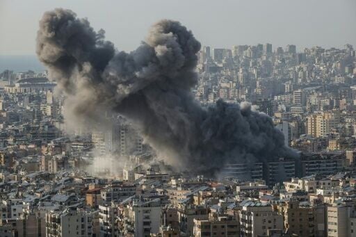 Smoke billows from an Israeli strike in the southern suburbs of Beirut during the Middle East war on March 10, 2026