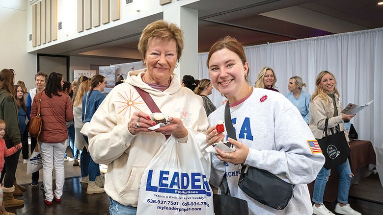 Tammy Greenland and her daughter, Elise, both from Barnhart, try dessert samples at last year’s fair.