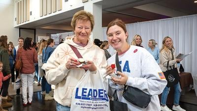 Tammy Greenland and her daughter, Elise, both from Barnhart, try dessert samples at last year’s fair.
