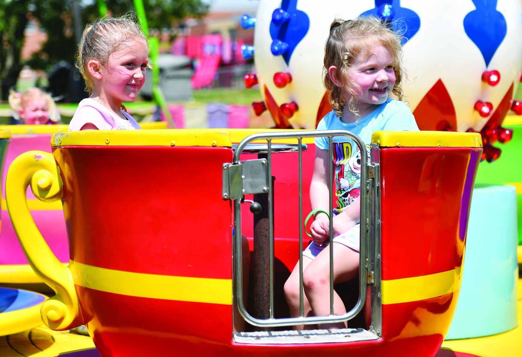 Sisters Rori and Nayvie Meczkowski enjoy a ride in 2024.