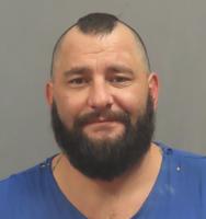 House Springs man charged after pond vandalized