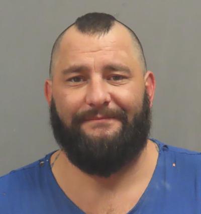 House Springs man charged after pond vandalized