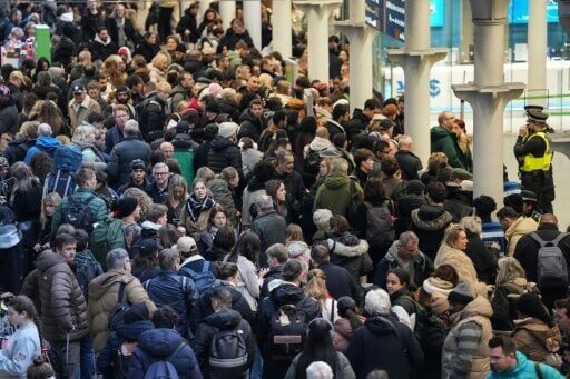 Crowds of stranded travellers swelled at Eurostar terminals, including in St Pancras station in London