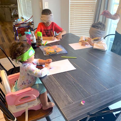 My grandchildren doing the blindfold favorite animal drawing - Joan Snyder, Hillsboro, Mo.jpg