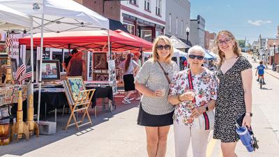 Karen Fischer of Barnhart and her mom, Carol Rockwell, and daughter, Anna Fischer, 16, shop at the 2024 Art Walk.
