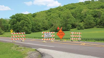 Hwy. W is closed near the entrance to the Bluffs subdivision in Hoene Springs.