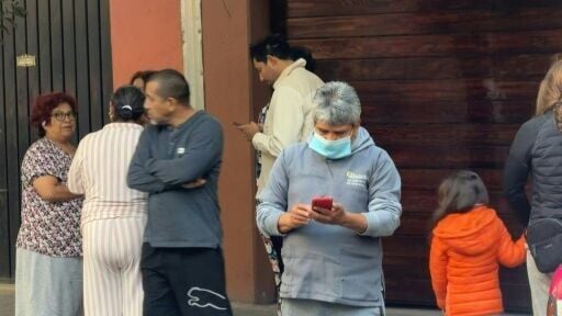 People on the street after 6.5-magnitude earthquake shakes Mexico City and parts of southwestern Guerrero state