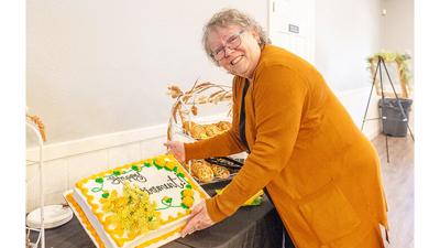 About 100 people attended Linda Wolf’s retirement party on Nov. 29.