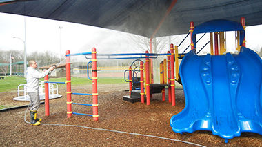 Dave Smith of Fully Involved Power Washing volunteers to clean playgrounds at Festus parks.
