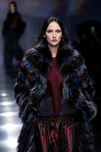 Silvana Armani found moments of theatricality, such as mixing shades of grey, claret and blue on a faux-fur coat.
