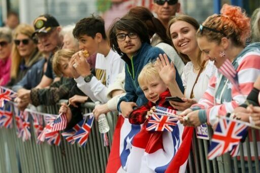 Royal fans attend a parade and block party for King Charles III and Queen Camilla in Front Royal, Virginia