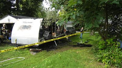 This camper outside a Pevely-area home was destroyed by fire.