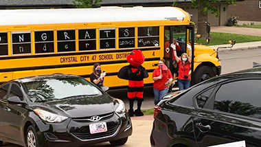 Crystal City administrators, teachers and other staff members visited each of the district's kindergartners'  homes to hand-deliver their diplomas.