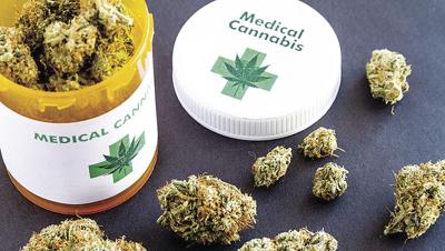 medical-marijuana-buds-on-black-background-picture-id483300738 color.jpg