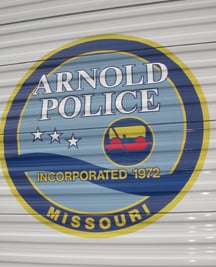 Arnold police logo