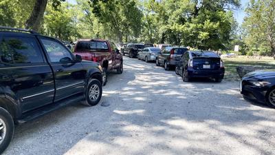Vehicles crowded into Rockford Beach