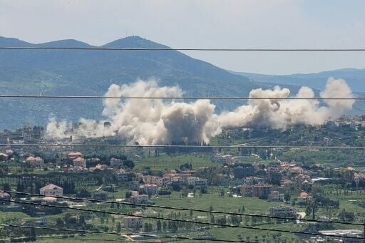 Smoke billows from explosions in the southern Lebanese village of Khiam, where the Israeli army has demolished residents' homes