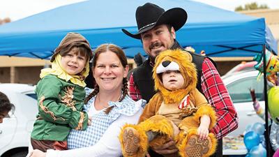 The Valli family from left, TJ, then 3, Chelsea, Tim and Dom, then 1, of High Ridge at last year’s Realty Executives Premiere trunk-or-treat event.