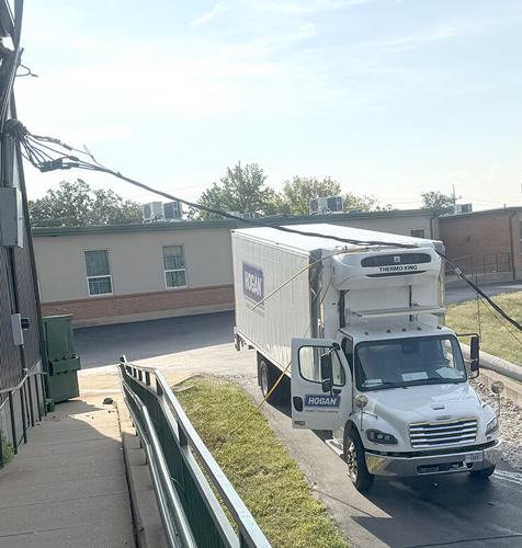 De Soto Primary closes after truck strikes power lines
