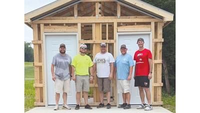From left, Public Works director Dan Turner, street foreman Curtis Binsbacher, Crystal City High School Principal Eric Pouvaranukoah, City Administrator Jason Eisenbeis and Crystal City Mayor Mike Osher recently volunteered to construct restrooms at the...