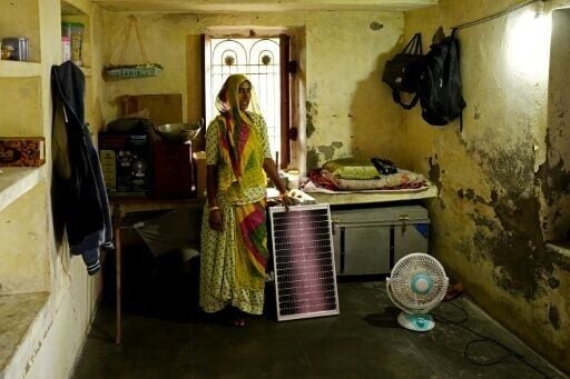 Champa Devi struggles to make enough money to cover her miner husband's medical bills