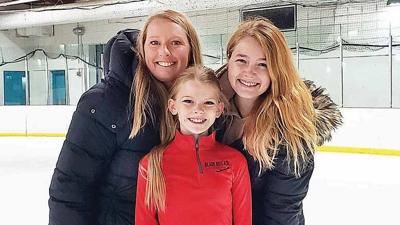Rebekah Stockwell, 13, of Byrnes Mill with her figure skating coaches, Brianne Arnaiz, left, and Ashley Klotz, right.