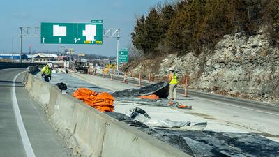 Construction crews work on northbound I-55 before the exit to Festus.