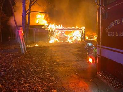 Fire destroys garage, lumber, sheds north of De Soto