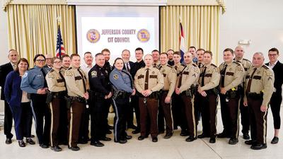 County officials with the 22 honorees at the CIT Officer Awards Banquet in March.