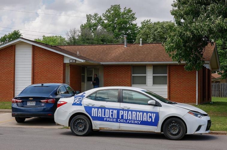 Chris Clubbs delivers medication to a patient
