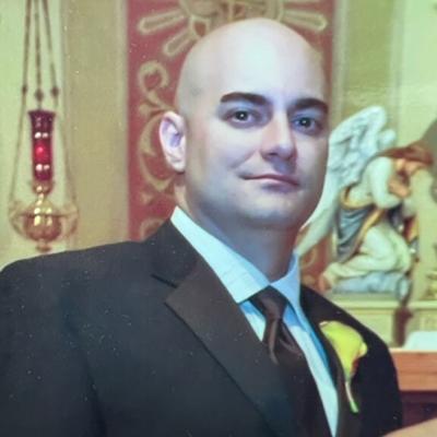 Adam M. England, 47, Imperial