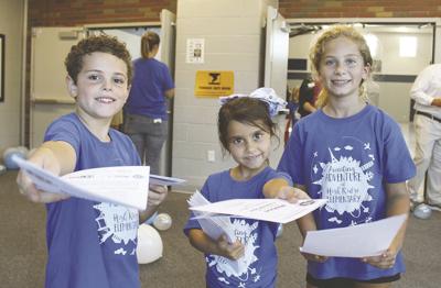 10 Christian Rains , Olivia Rivas and  greet guests at the open house.jpg