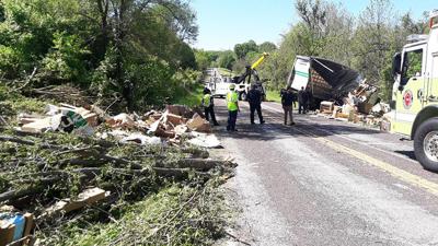 This morning, a box truck ran off I-55 and onto Ozark Drive in Arnold, where it crashed, spilling furniture onto the road.