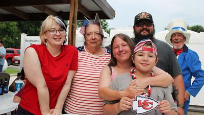 From left, Cyrus, Cheryl, Genevieve, Hunter and Zach Wycoff, with Eric Nix dressed as Uncle Sam in the background at Cedar Hill Elks’ Independence Day celebration.