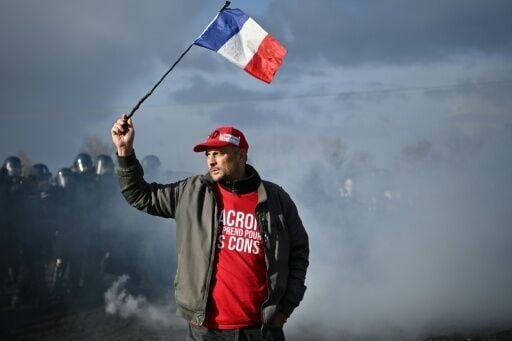 In France, riot police broke up a blockade by farmers at an oil depot in Bassens, near Bordeaux