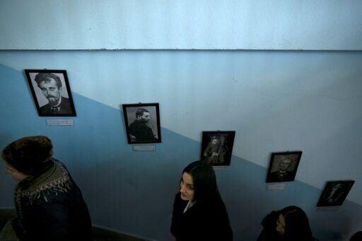 Kosovo Serb voters in Gracanica queue to vote in the last general election in February